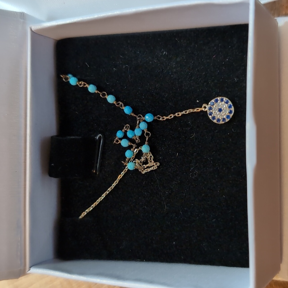 Elegant Gold Necklace with Sapphire Turqioise Accents and Evil Eye Design - Picture 10 of 12